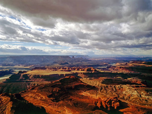 istock Canyonlands with clouds in  Utah 957774830