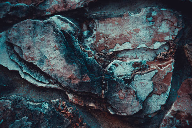 istock Close up of natural stone wall. Stone wall texture 957781892