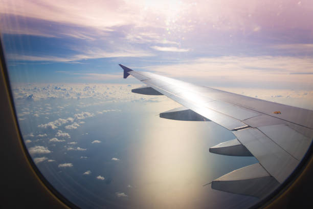 istock Top view with clouds from the aircraft window 957782044