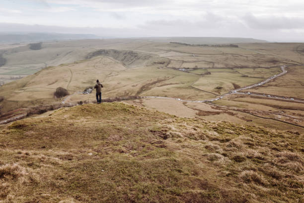 istock man on top of the hill 957782508