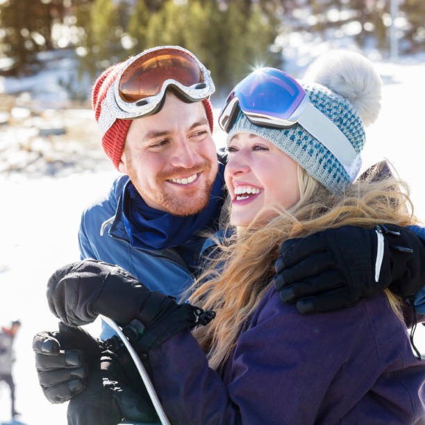 istock Young couple enjoy skiing together 957786724
