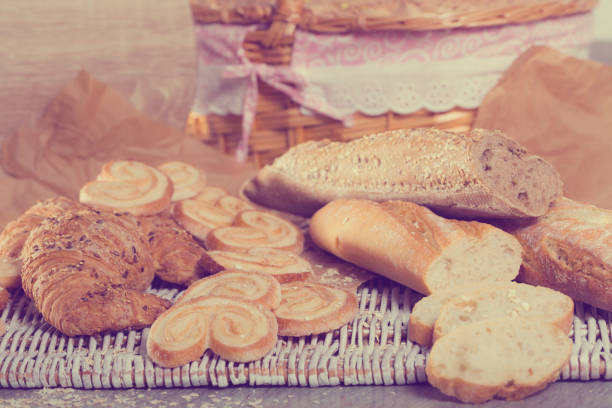 istock Various kinds of bread and  bakery products on table 957793748