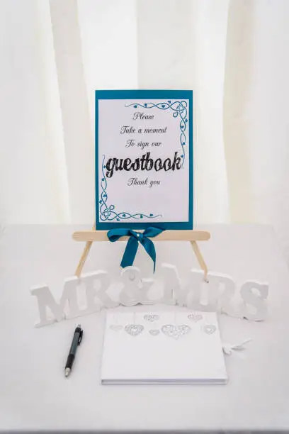 Wedding Guestbook on a table with Mr and Mrs Letters