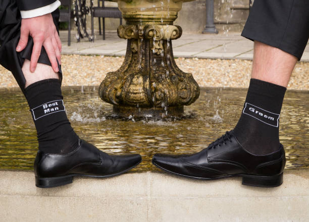 Best man and Groom with named socks, close up