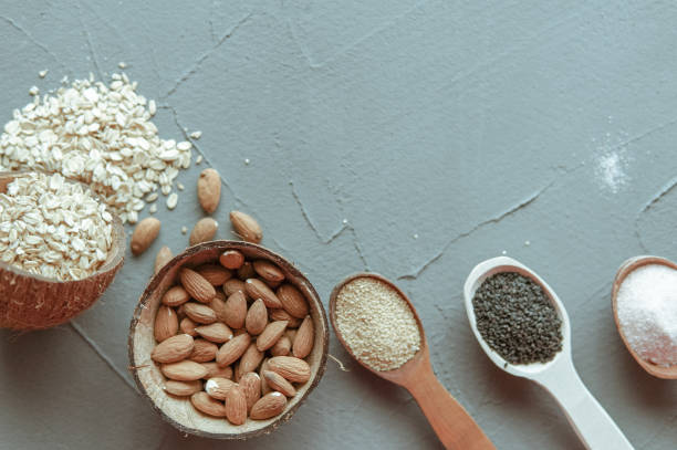 istock Superfood in spoons over gray concrete background 957807740