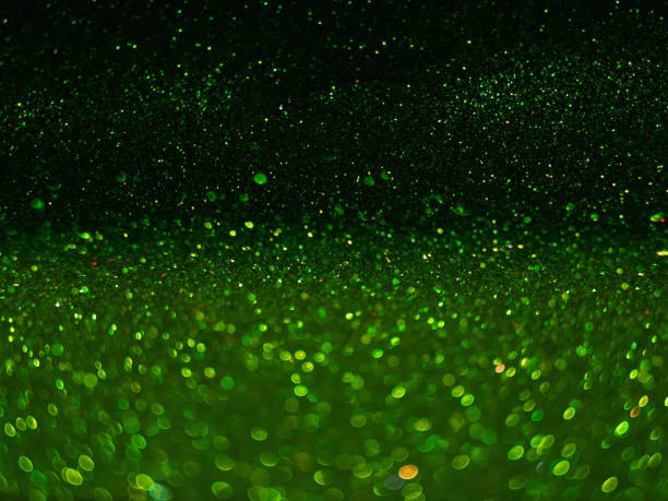 istock Green bokeh background, abstract with defocused lights. 957812168