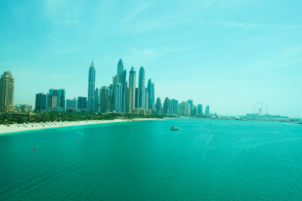 istock Dubai Marina waterfront, view from the sea 957812370