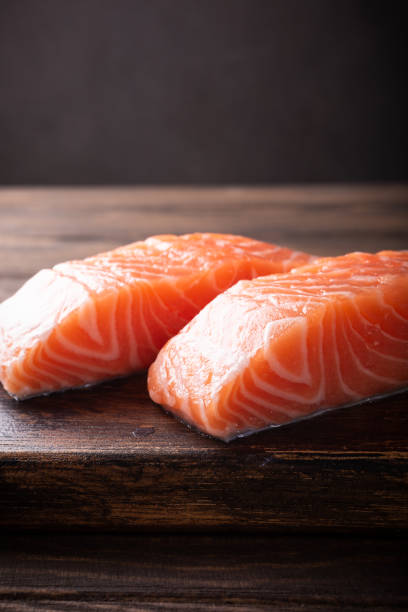 istock Fresh raw salmon fillet, flat lay 957814742