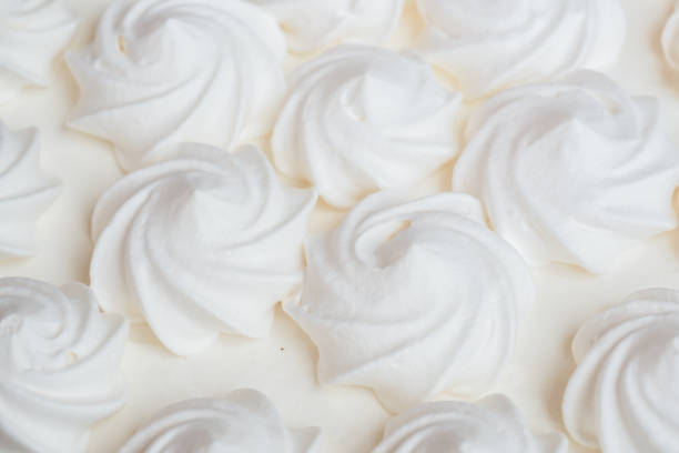 istock Delicious light ice cream cake with roses cream Background 957815244