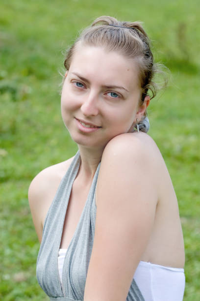 istock beautiful girl in a meadow 95781947