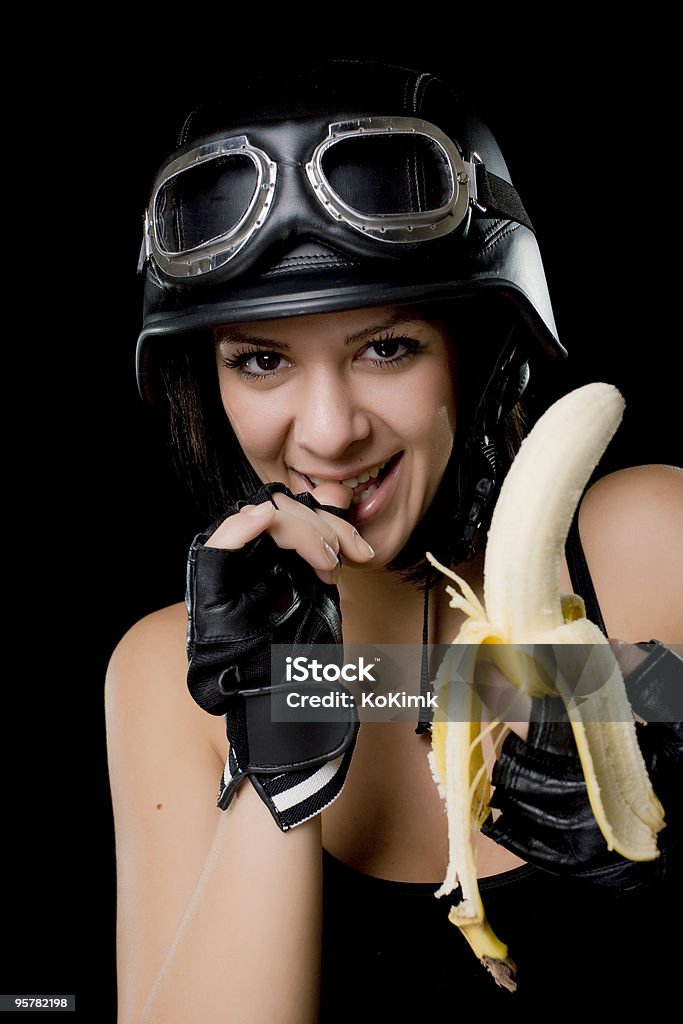 Retrato de uma menina comendo a banana - Foto de stock de Adulto royalty-free