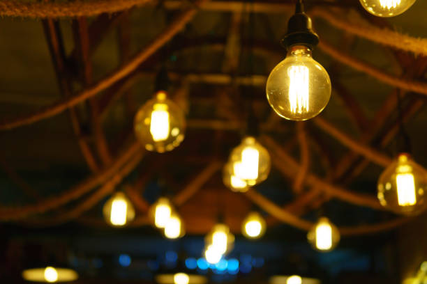 istock edison light bulbs style hanging on the ceiling for decorated in antique style. idea concept. 957824686