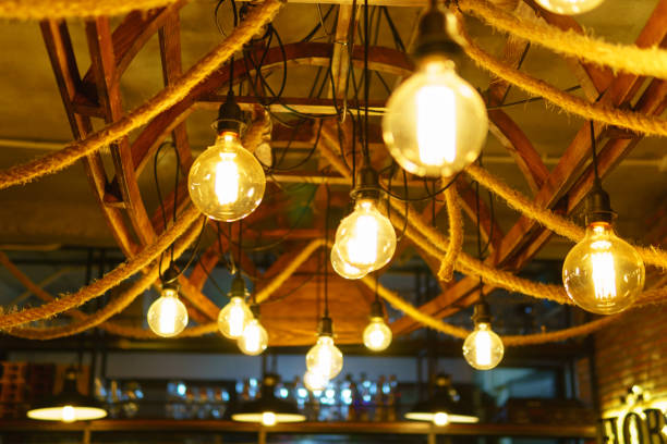 istock edison light bulbs style hanging on the ceiling for decorated in antique style. idea concept. 957824694