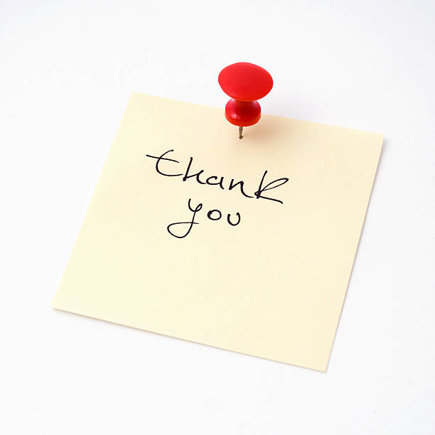 istock Thank you on a sticky note and push pin 95782895