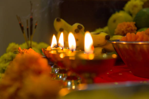 istock Incense, flowers, candles, sweets and fruits 957838940