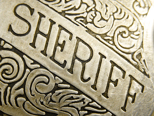 istock Close Up Engraving on Sheriff Badge 95783926