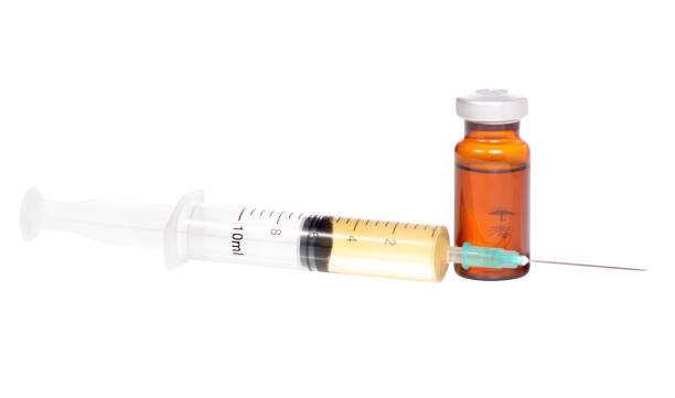 istock Syringe and medical ampoule 957841544