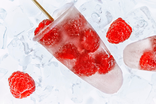 Homemade Raspberry Popsicle's on Ice