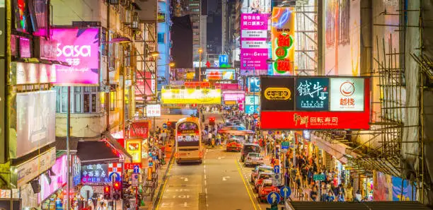 Photo of Hong Kong Kowloon neon night city crowded streets panorama China