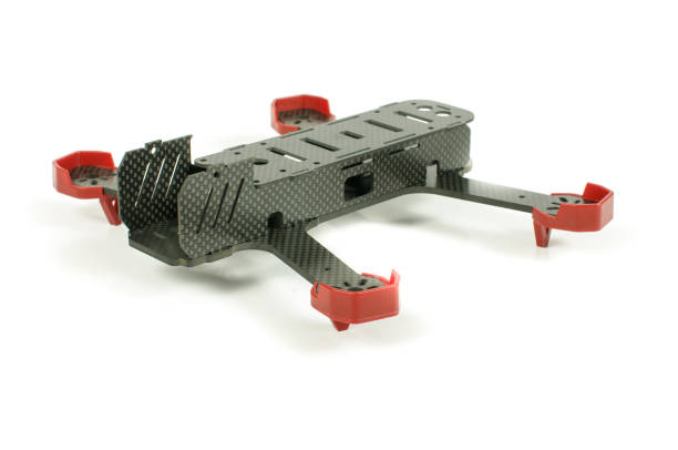 istock Carbon fiber racing drone frame isolated on the white background 957846530