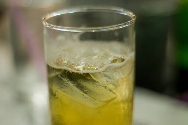 istock One beer glasses with beer on the bar 957852148