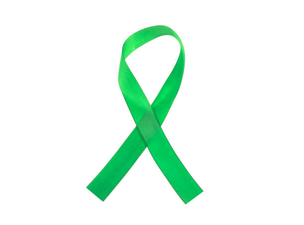 istock Green awareness ribbon isolated on a white background 957860290