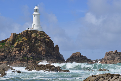 Telephoto image of a coastal landmark.