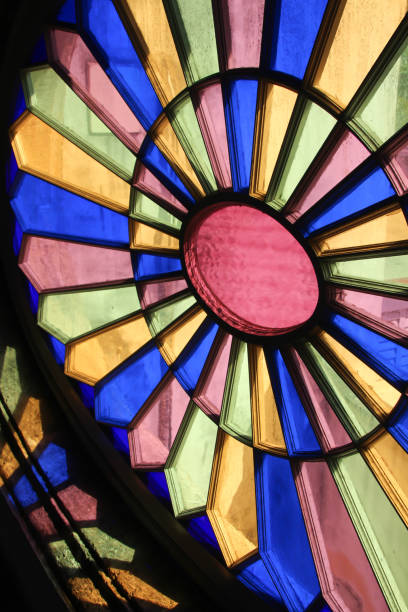 istock Stained glass window with a backlight of sunshine 957875012