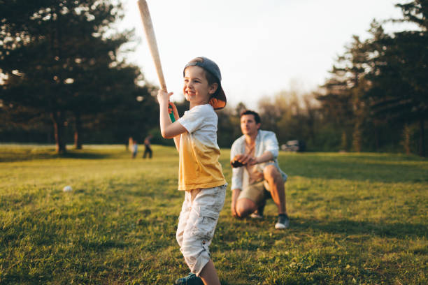 little league practice with my dad - playing catch imagens e fotografias de stock