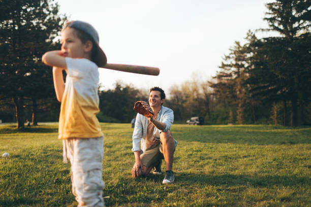 istock Little league practice with my dad 957879818