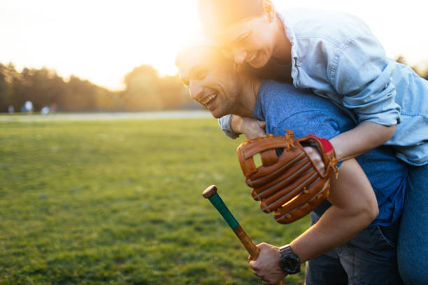 istock Celebrating after a casual softball game 957879920