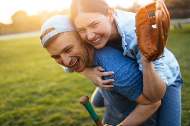istock Celebrating after a casual softball game 957879970