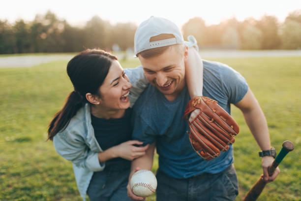 istock Celebrating after a casual softball game 957880114