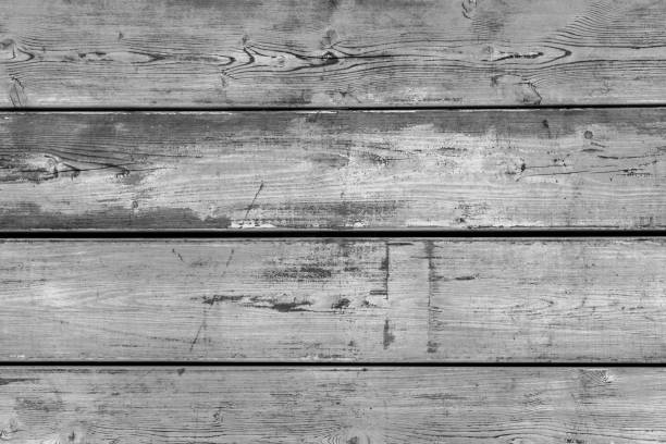 istock Wall from wooden horizontal boards close-up. Wood texture. Black and whit image. 957883816