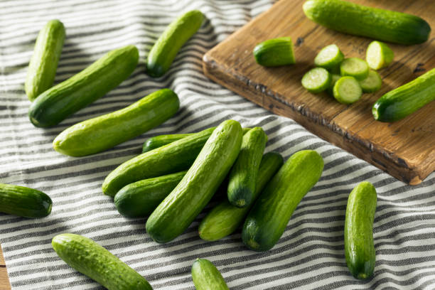 istock Raw Green Organic Baby Cucumbers 957887864