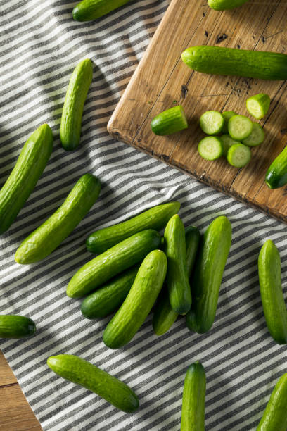 istock Raw Green Organic Baby Cucumbers 957887946
