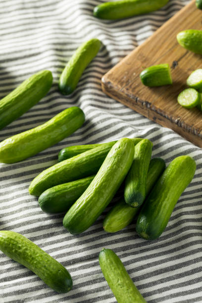 istock Raw Green Organic Baby Cucumbers 957888180