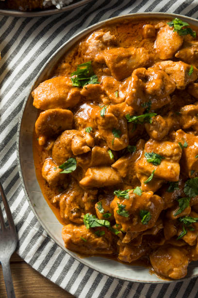 istock Homemade Indian Butter Chicken with Rice 957889346
