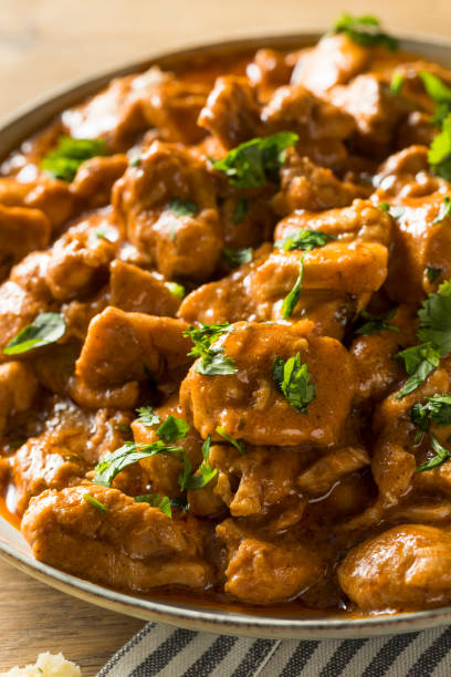istock Homemade Indian Butter Chicken with Rice 957889472