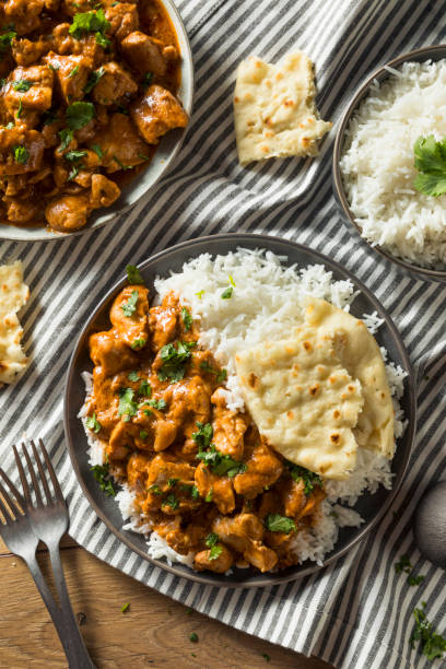 istock Homemade Indian Butter Chicken with Rice 957891680