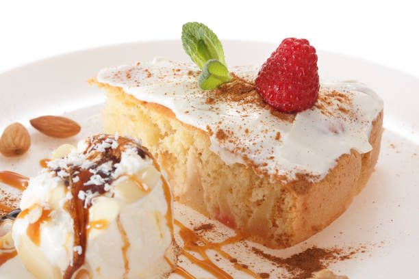 istock Apple biscuit cake and ice cream on plate isolated on white background 957891952
