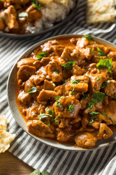 istock Homemade Indian Butter Chicken with Rice 957892052