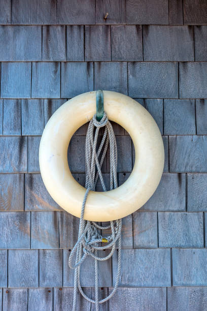 anel de vida na casa de campo - life belt nautical vessel life jacket buoy - fotografias e filmes do acervo