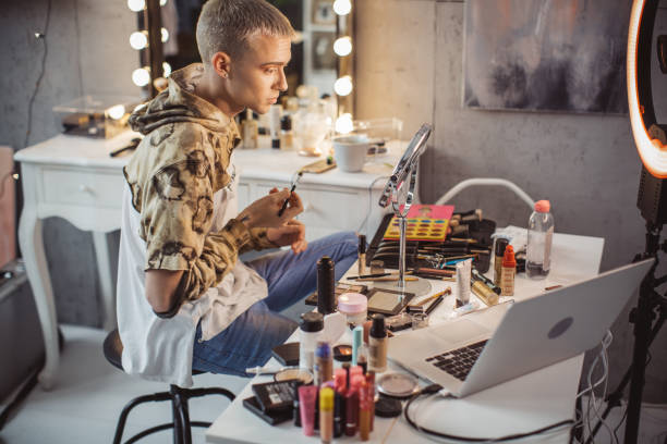 istock Young male makeup artist 957895852