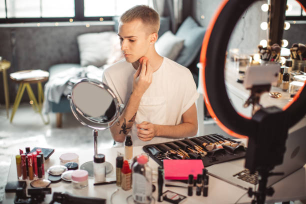 istock Young male makeup artist 957896364