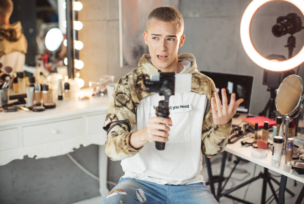 istock Young male makeup artist 957896552