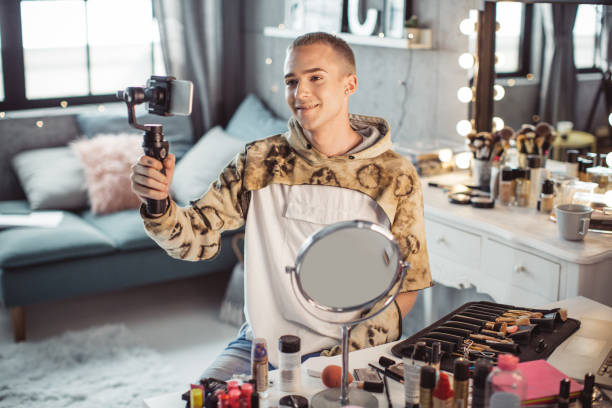 istock Young male makeup artist 957896670