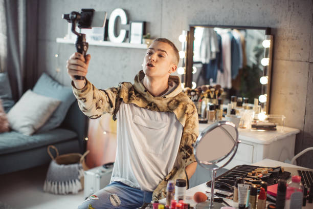 istock Young male makeup artist 957896736