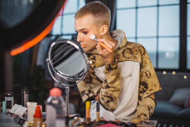 istock Young male makeup artist 957896756