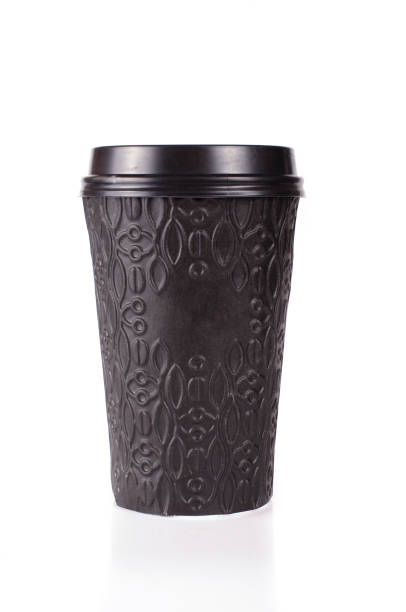 Black modern disposable paper coffee cup with plastic lid isolated on the white background with coffee beans Black paper coffee cup with plastic lid cup disposable cup paper insulation stock pictures, royalty-free photos & images